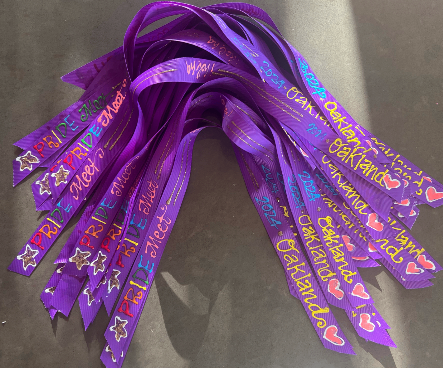 Purple hand painted Jackrabbits ribbons personalized with children's names, stars and hearts